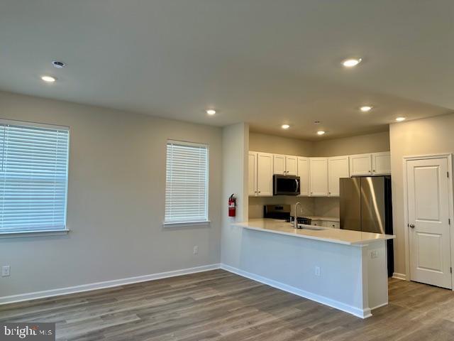 11 Anna Lane Westampton, NJ 08060 - Photo 5 of 28 a kitchen with stainless steel appliances a refrigerator and a stove top oven