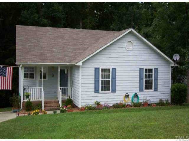 4449 Labrador Drive Raleigh, NC 27616 - Photo 1 of 1 a front view of a house with a yard and porch