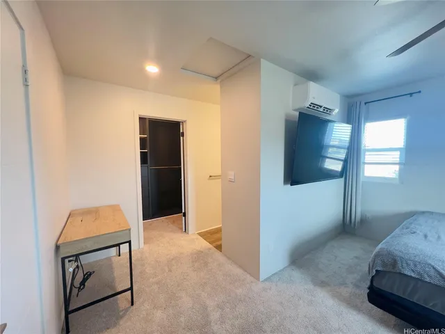 a view of livingroom with furniture and window