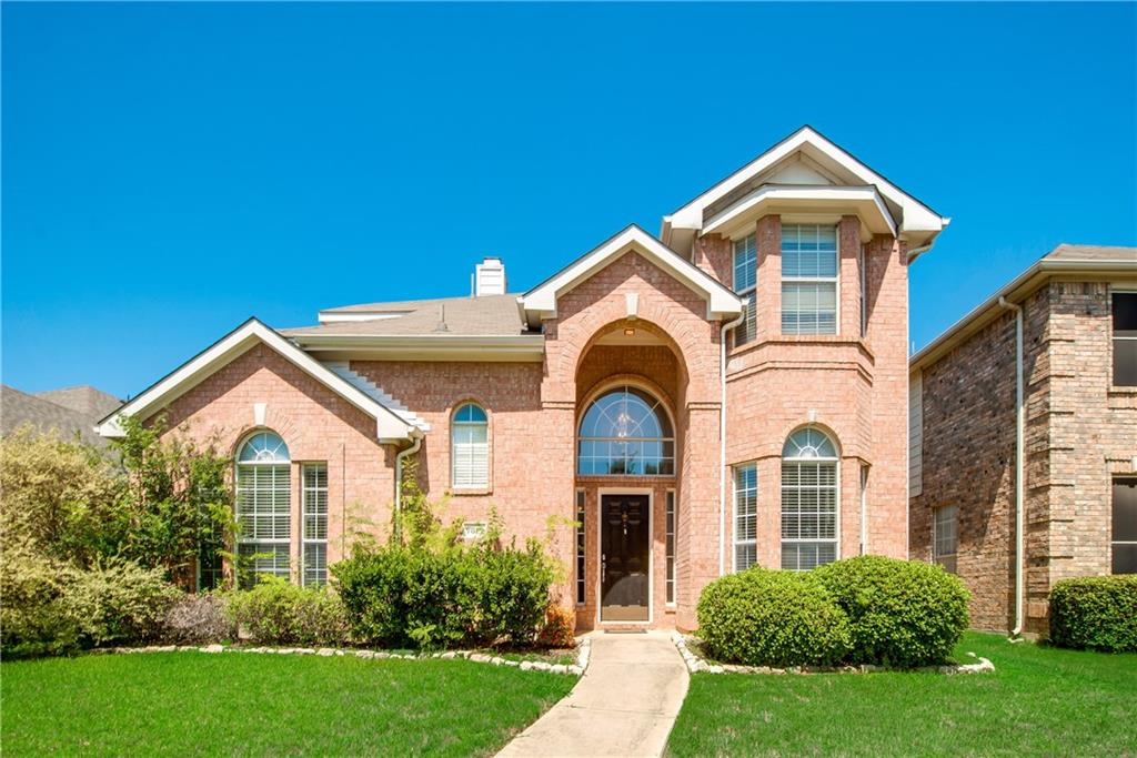 7813 Park Run Road Fort Worth, TX 76137 - Photo 1 of 1 a front view of a house with garden