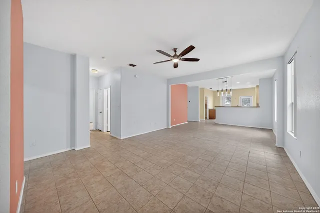 a view of a livingroom with a ceiling fan