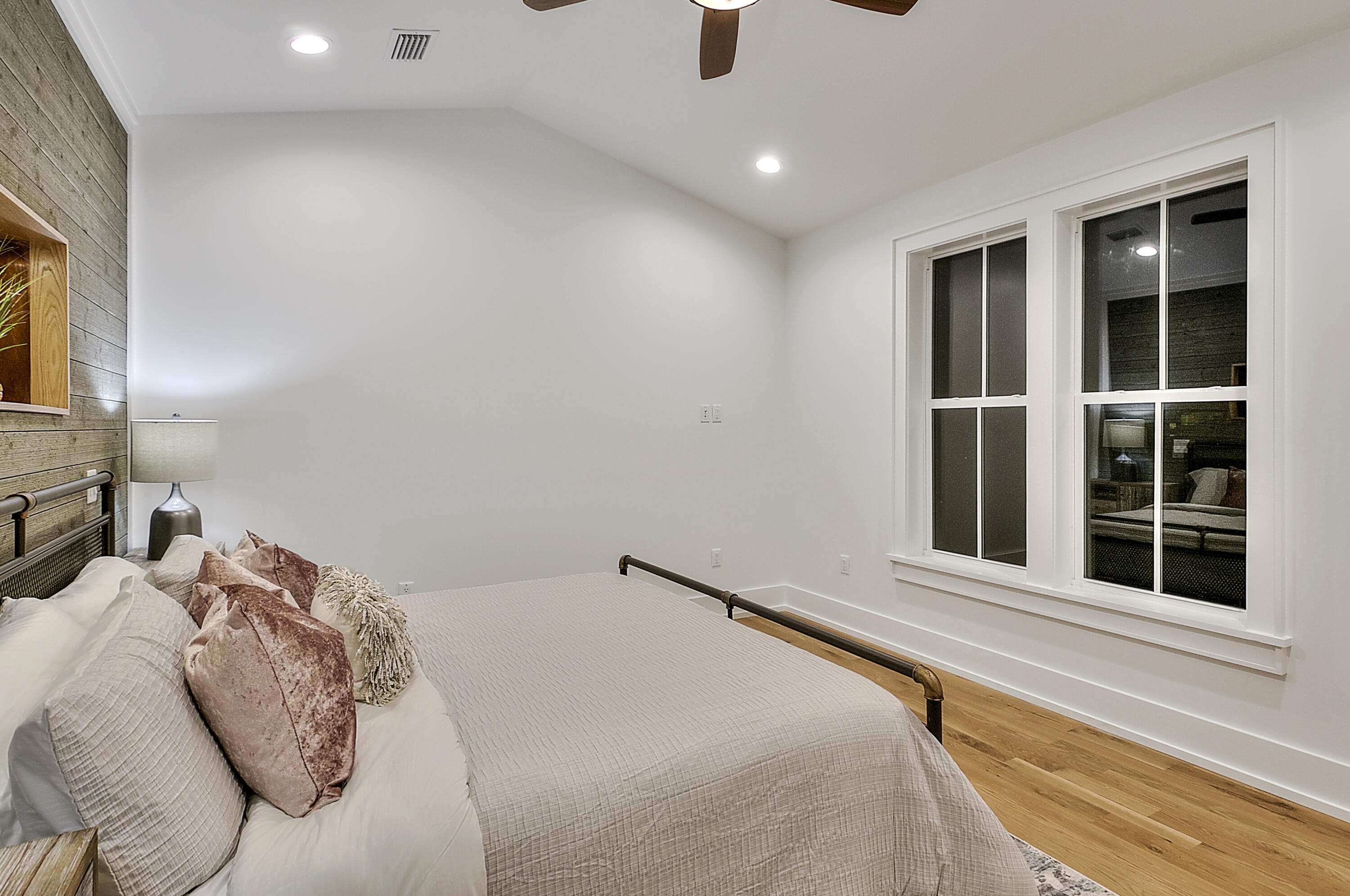 30 Baird Road Santa Rosa Beach, FL 32459 - Photo 17 of 104 a bedroom with a bed and a large window