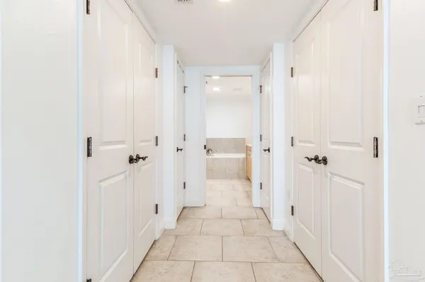 a view of a bathroom with a glass door shower