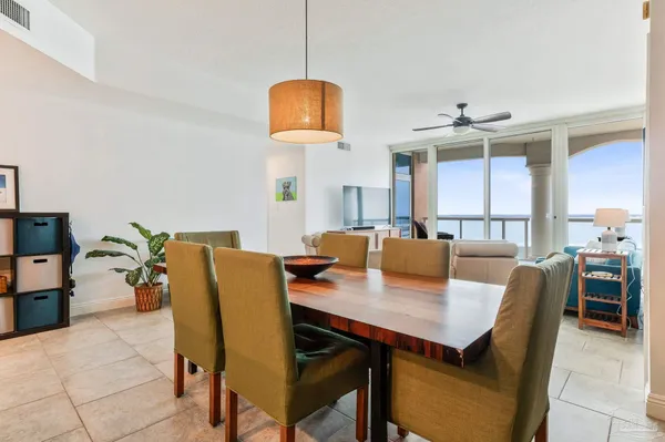 a view of a dining room with furniture