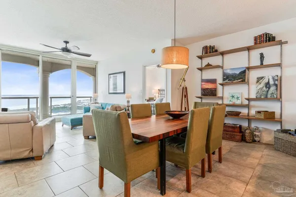 a view of a dining room with furniture