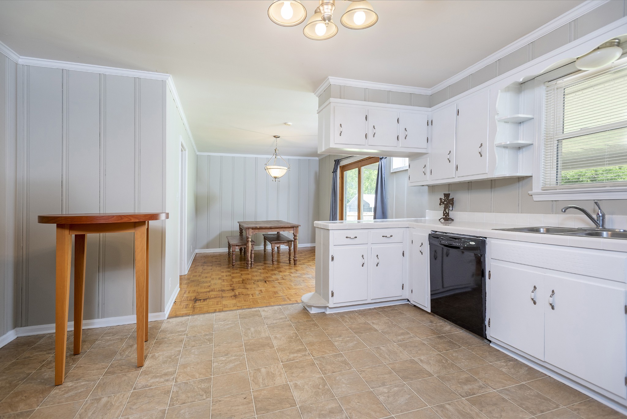 598 Franklin Road Lebanon, TN 37087 - Photo 6 of 18 a kitchen with a stove a sink cabinets and a window