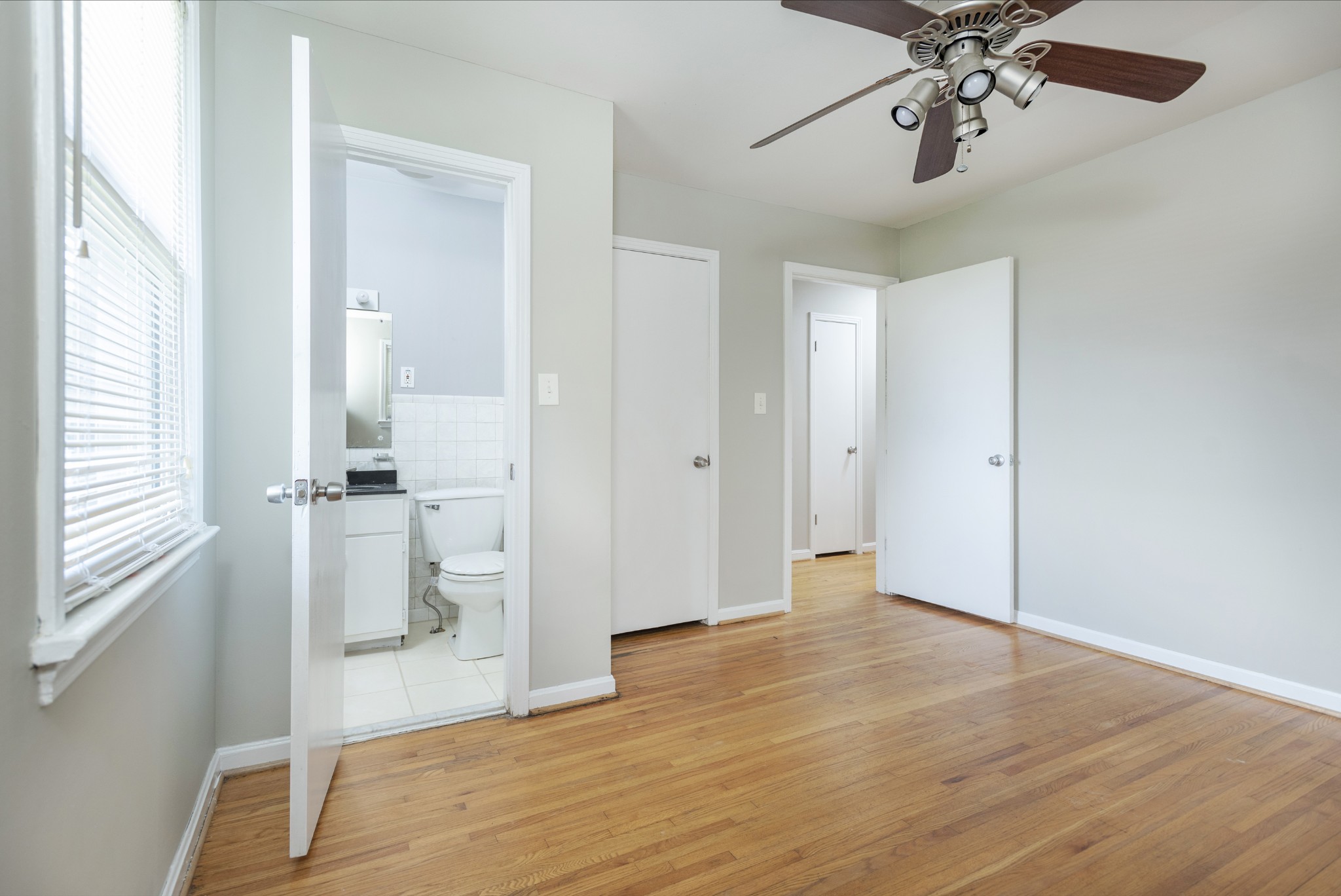 598 Franklin Road Lebanon, TN 37087 - Photo 10 of 18 wooden floor in an empty room with a window
