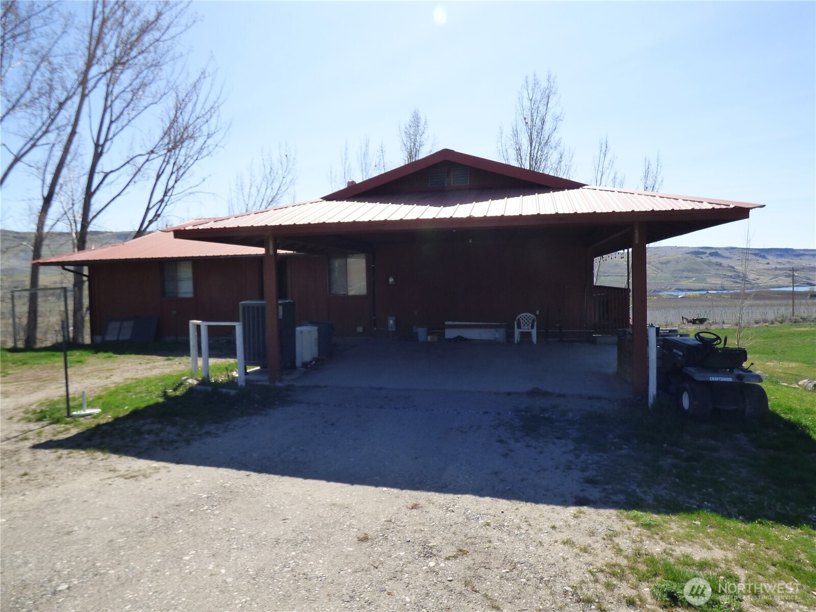 543 Jack Wells Road Bridgeport, WA 98813 - Photo 24 of 24 a front view of house with yard barbeque oven and outdoor seating