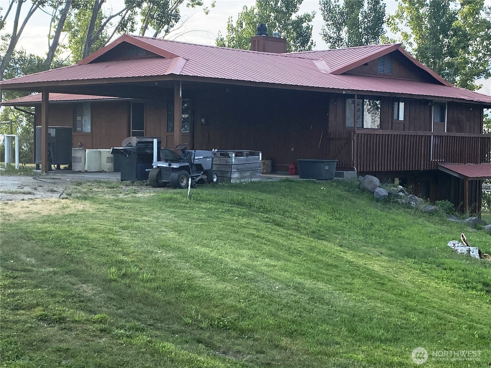 543 Jack Wells Road Bridgeport, WA 98813 - Photo 10 of 24 a view of a house with a yard and sitting area