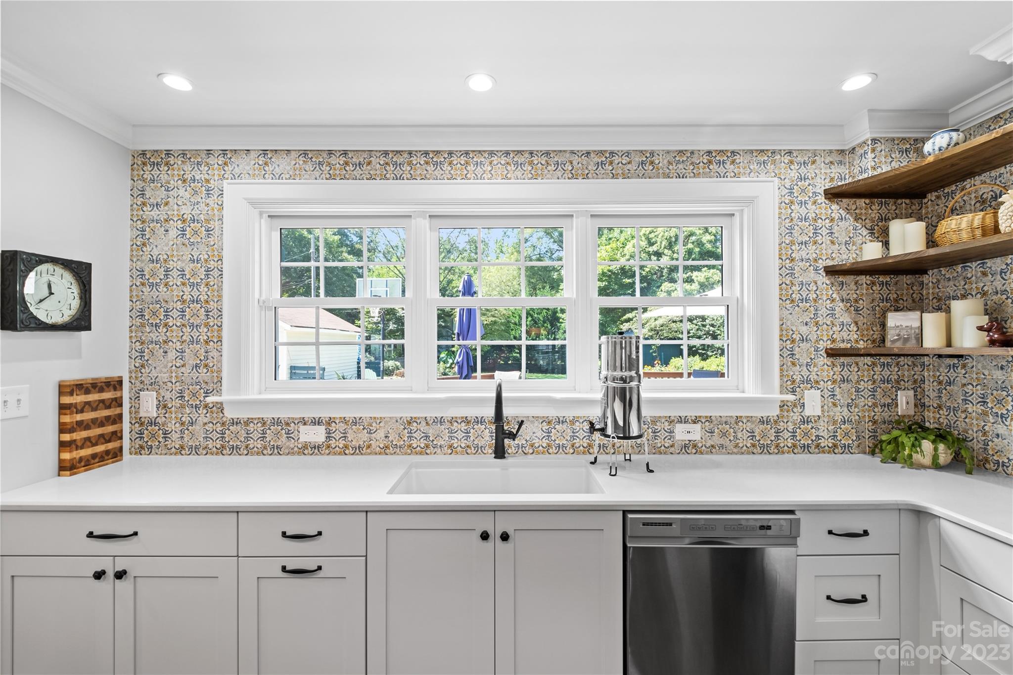 1324 Goodwin Avenue Charlotte, NC 28205 - Photo 12 of 29 a kitchen with a sink and large window