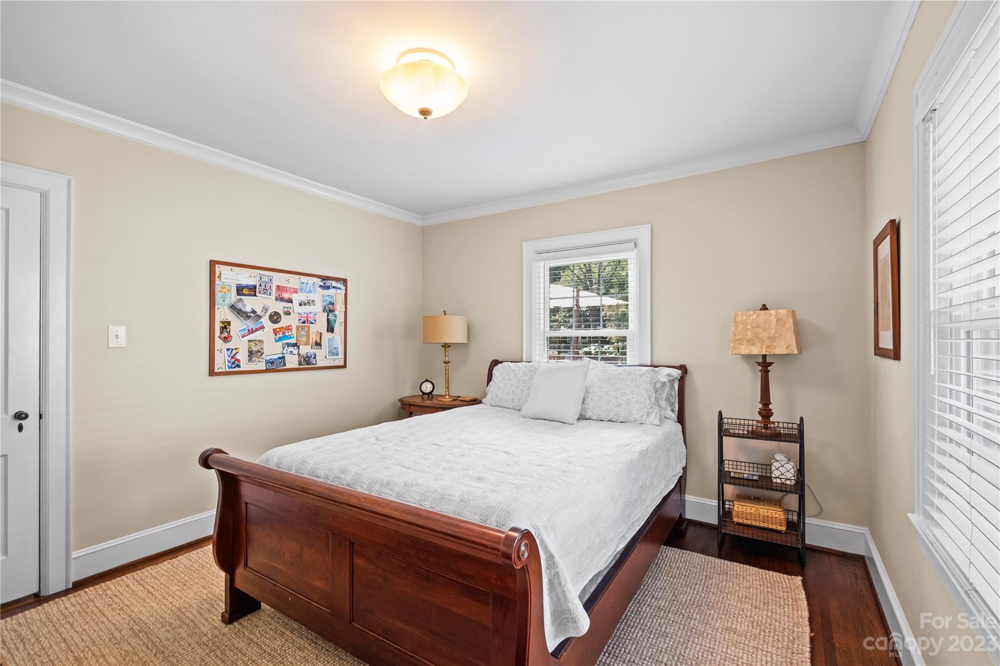 1324 Goodwin Avenue Charlotte, NC 28205 - Photo 13 of 29 a bedroom with a bed and a window