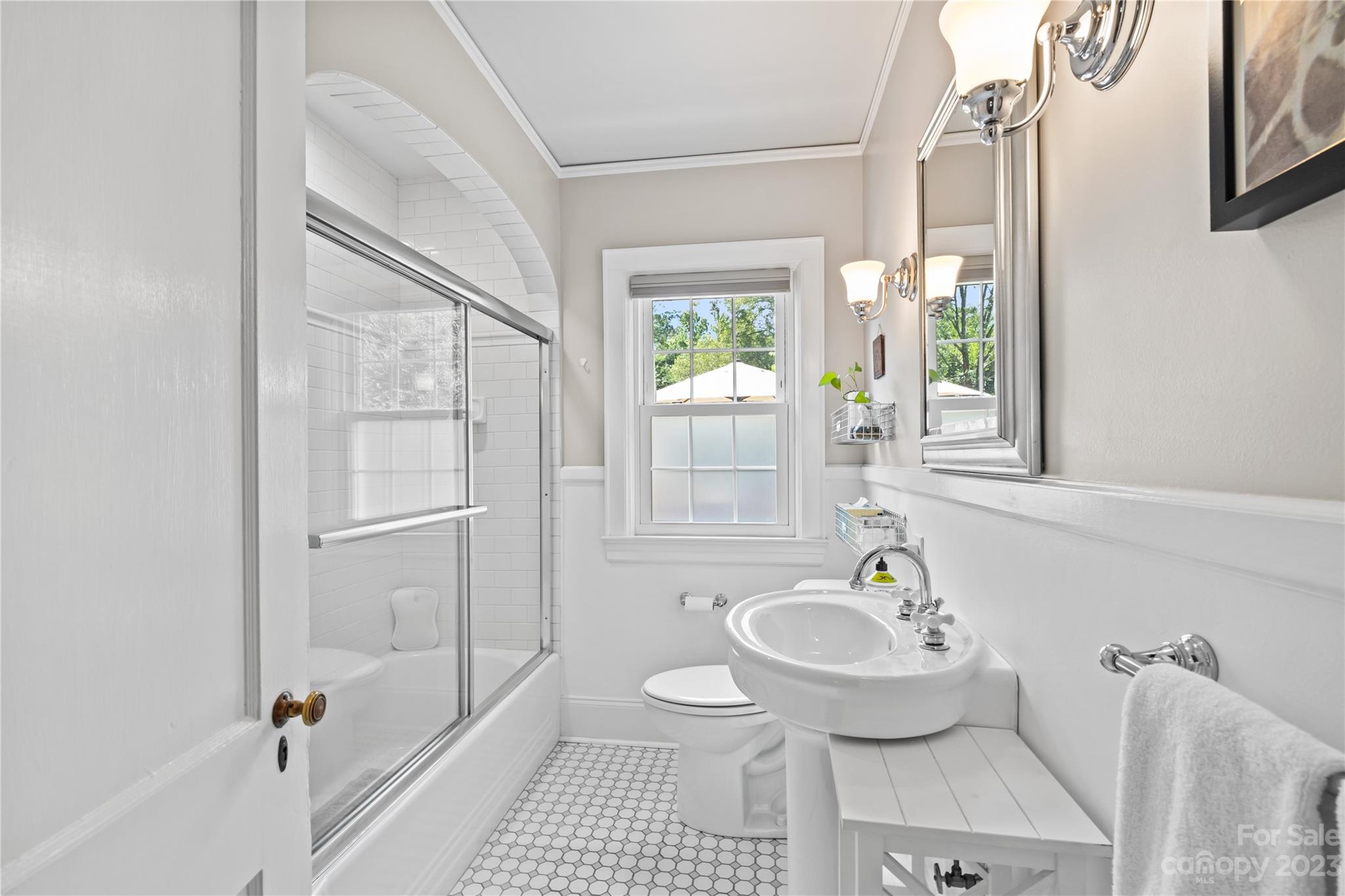 1324 Goodwin Avenue Charlotte, NC 28205 - Photo 15 of 29 a bathroom with a bathtub and a sink