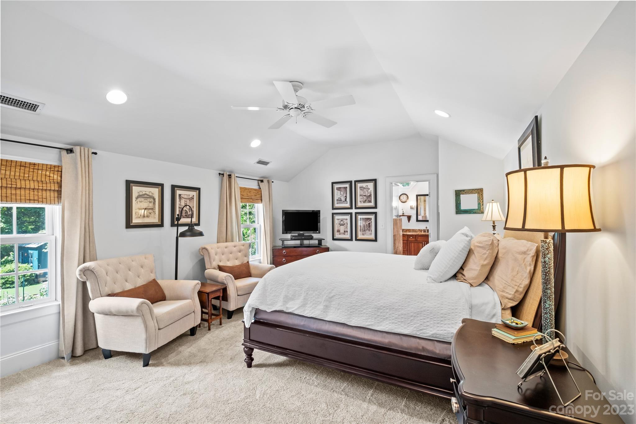1324 Goodwin Avenue Charlotte, NC 28205 - Photo 17 of 29 a bedroom with a large bed couch and a window