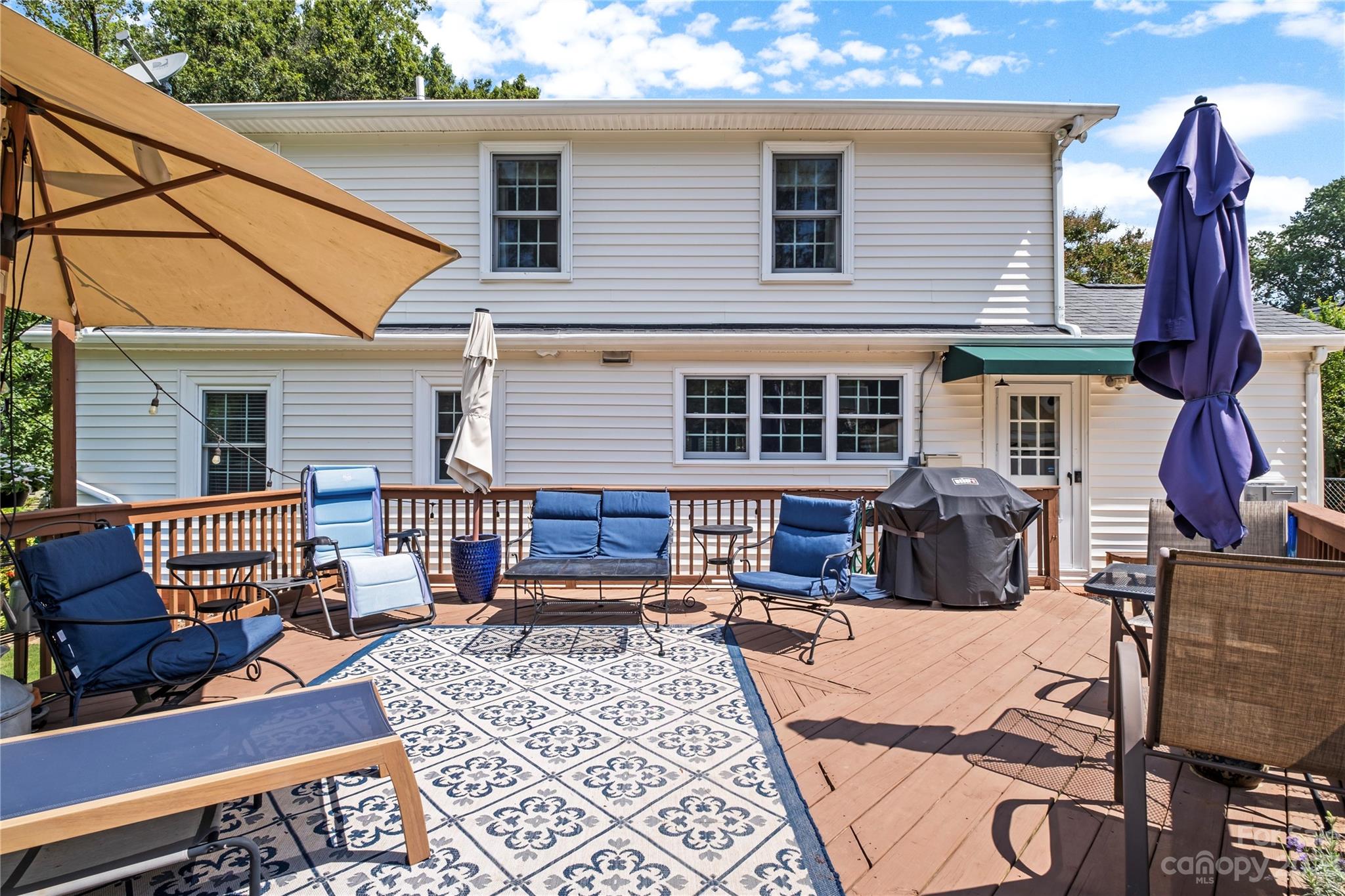 1324 Goodwin Avenue Charlotte, NC 28205 - Photo 24 of 29 a view of a chairs and tables in the back yard of the house