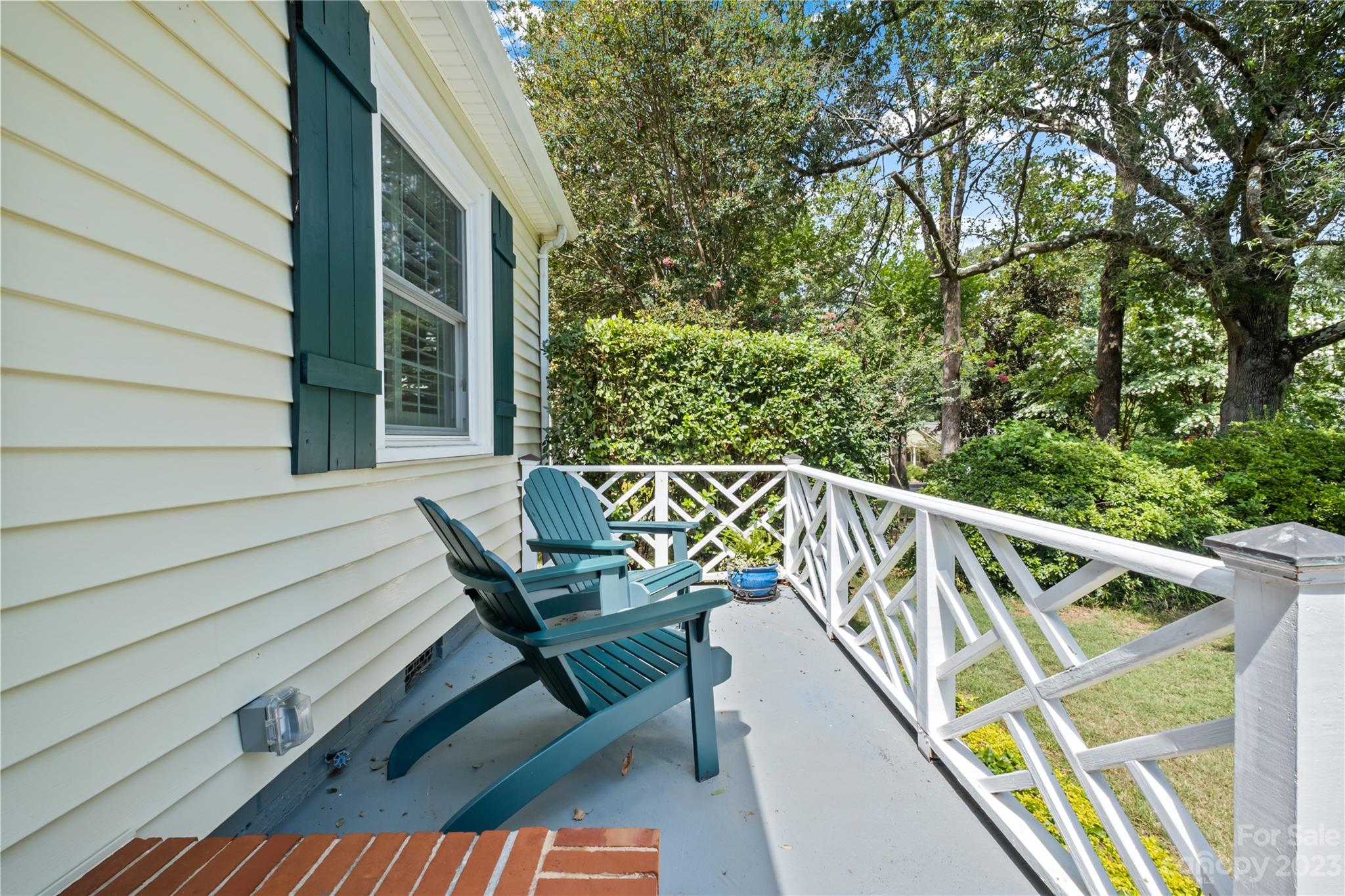 1324 Goodwin Avenue Charlotte, NC 28205 - Photo 27 of 29 a balcony with wooden floor and outdoor space