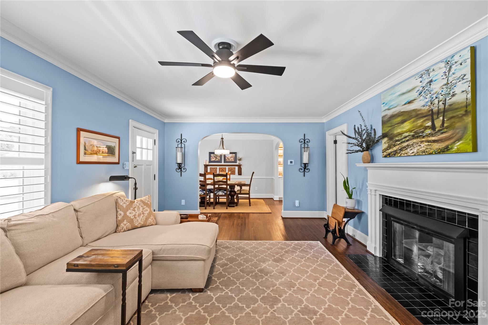 1324 Goodwin Avenue Charlotte, NC 28205 - Photo 3 of 29 a living room with furniture and a fireplace
