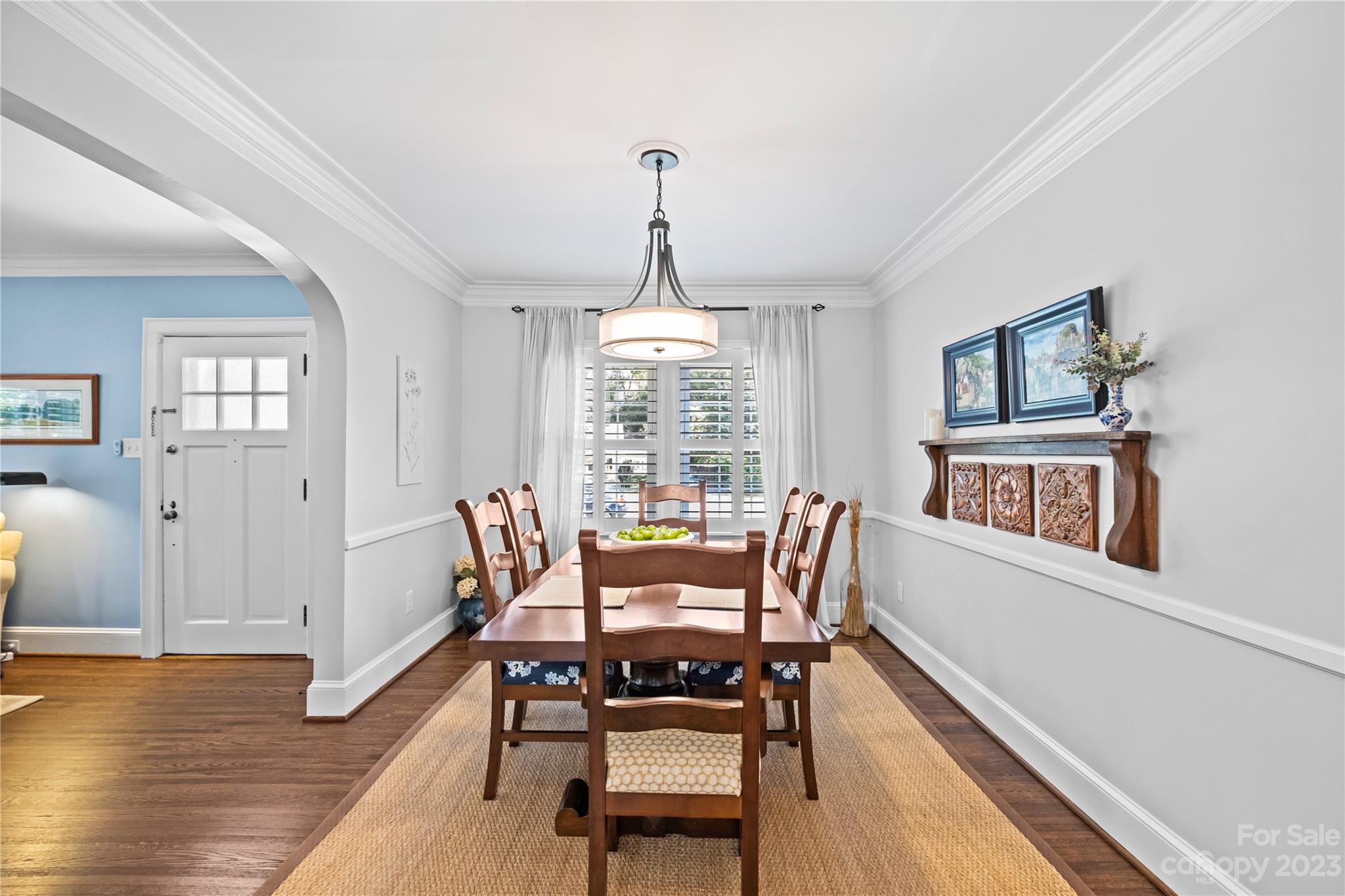 1324 Goodwin Avenue Charlotte, NC 28205 - Photo 4 of 29 a dining room with furniture window and wooden floor