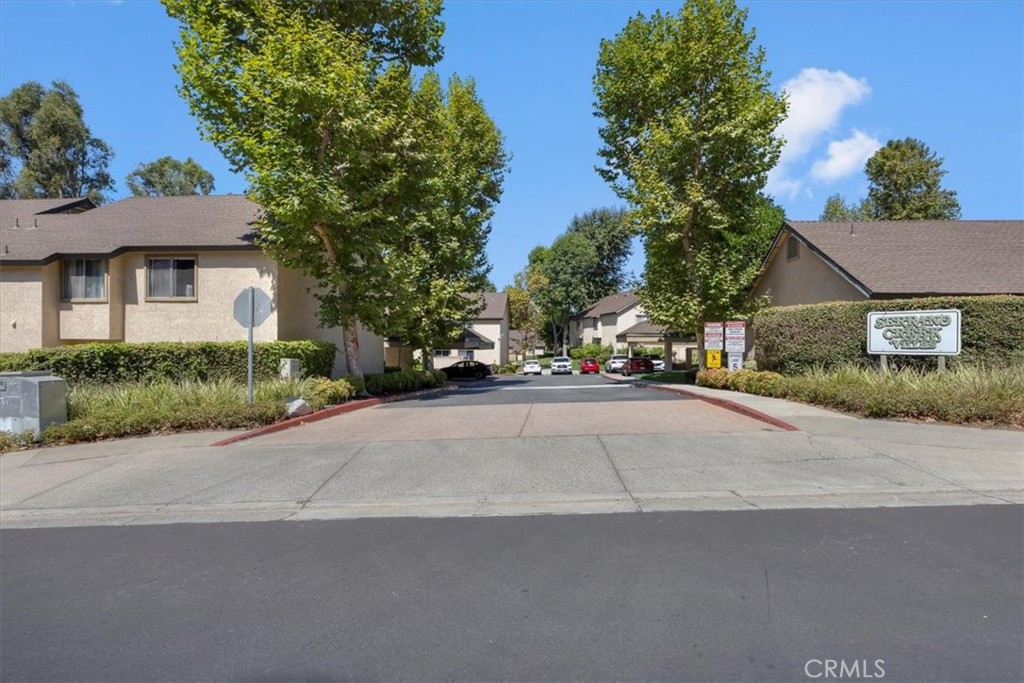 20914 Serrano Creek Road, Unit 48 Lake Forest, CA 92630 - Photo 22 of 22 front view of a house with a street