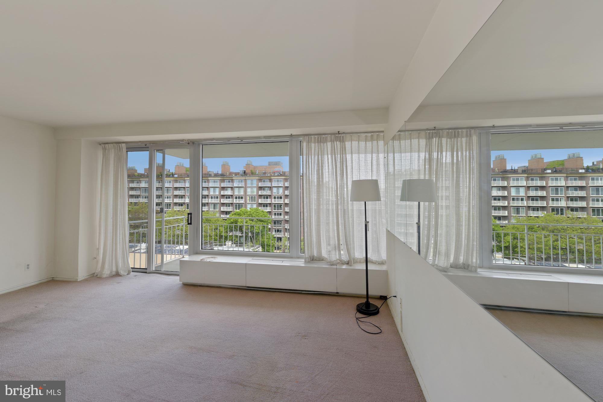 1425 4th Street Southwest, Unit A616 Washington, DC 20024 - Photo 10 of 25 Bright Airy Living Space opens to Balcon
