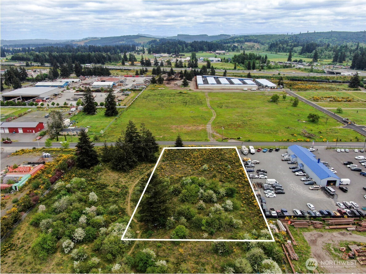 19445 Elderberry Street Southwest Rochester, WA 98579 - Photo 4 of 6 an aerial view of a residential building with outdoor space