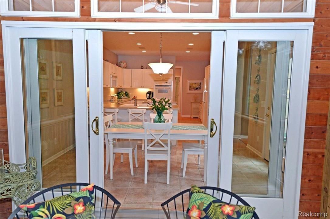 330 Ridgemont Road Oxford, MI 48370 - Photo 7 of 48 Screened Porch to Kitchen/Breakfast Nook