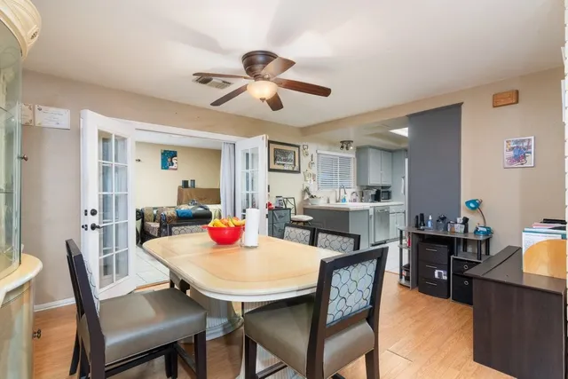 a view of a dining room with furniture and a livingroom