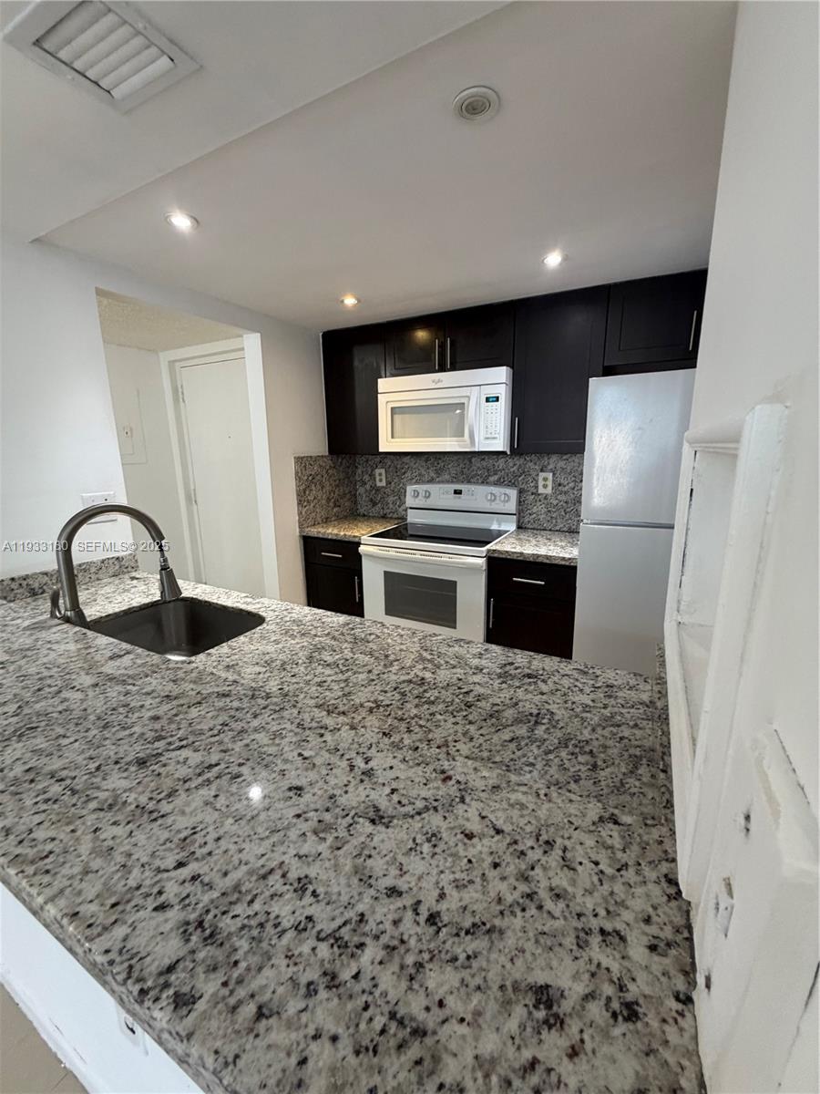 7075 Northwest 186th Street, Unit C409 Hialeah, FL 33015 - Photo 2 of 10