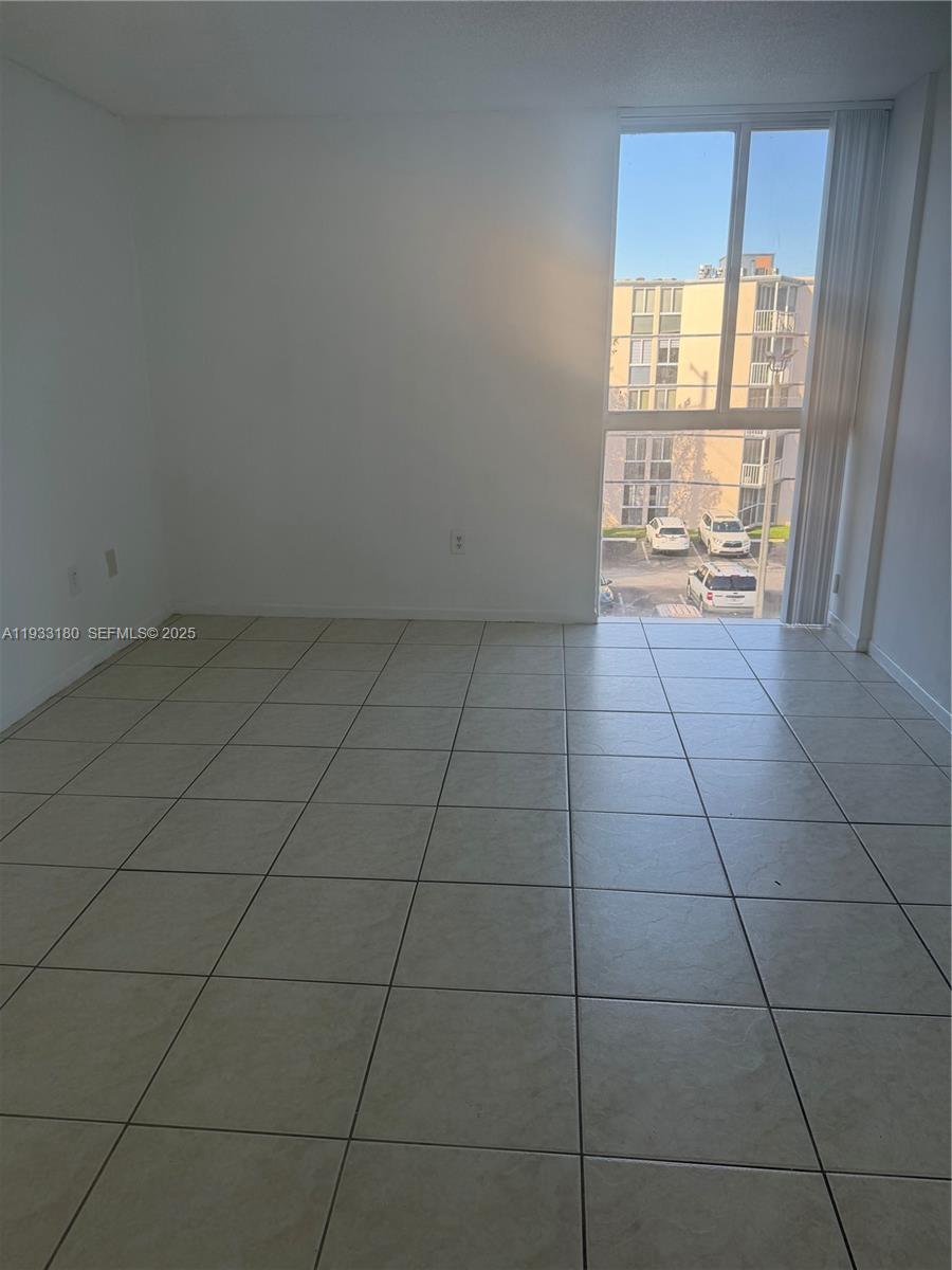 7075 Northwest 186th Street, Unit C409 Hialeah, FL 33015 - Photo 8 of 10