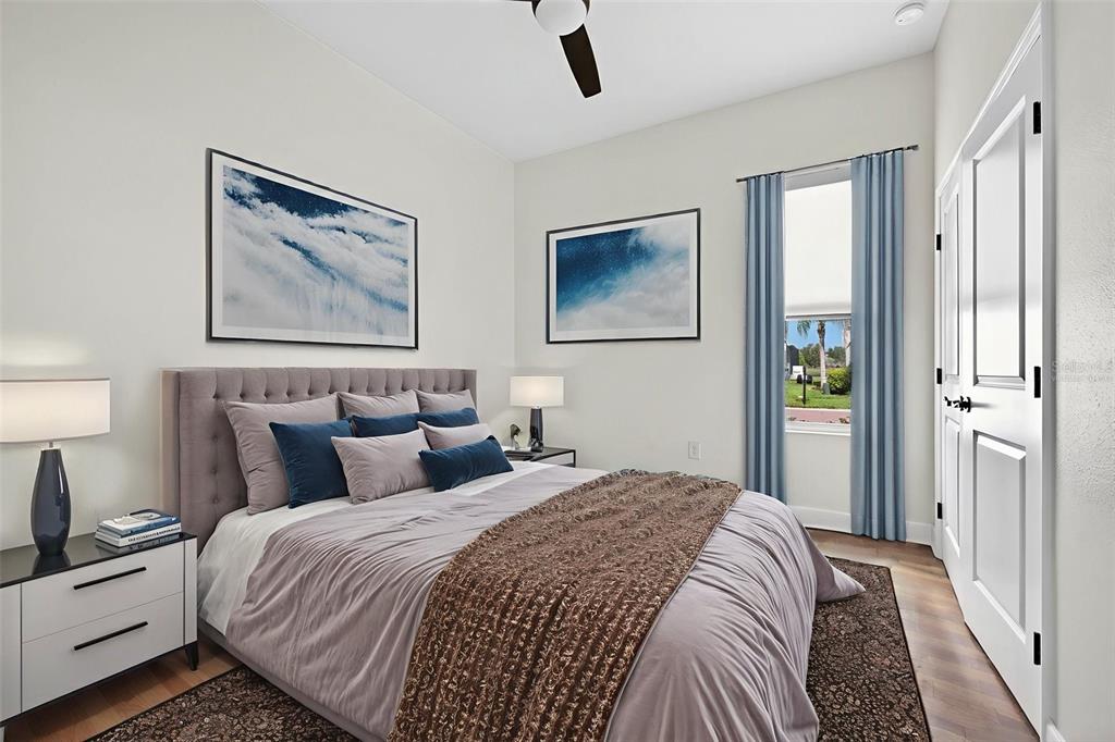 33487 Azalea Ridge Drive Wesley Chapel, FL 33545 - Photo 27 of 56 a bedroom with bed and cupboard