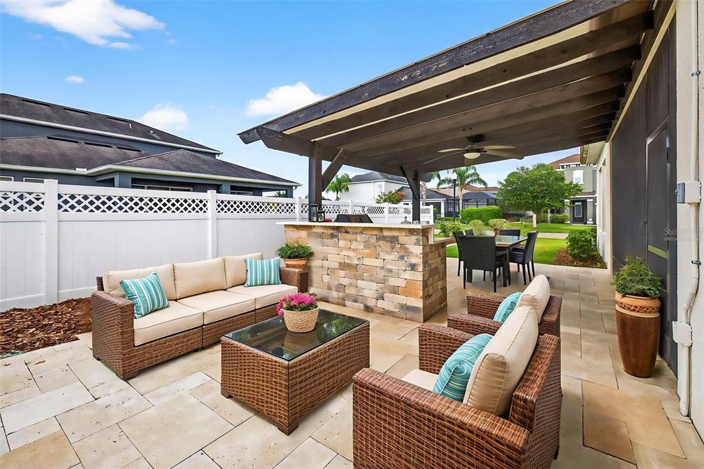 33487 Azalea Ridge Drive Wesley Chapel, FL 33545 - Photo 43 of 56 a outdoor living space with furniture and garden view