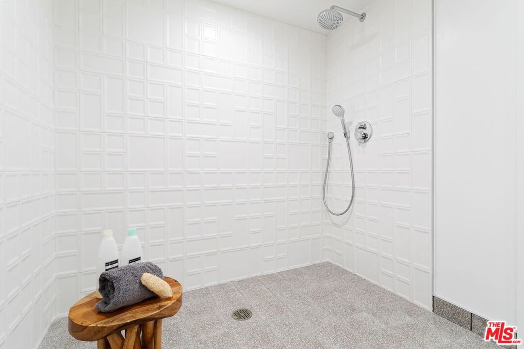 11620 Chenault Street, Unit 304 Los Angeles, CA 90049 - Photo 13 of 19 a bathroom with a shower