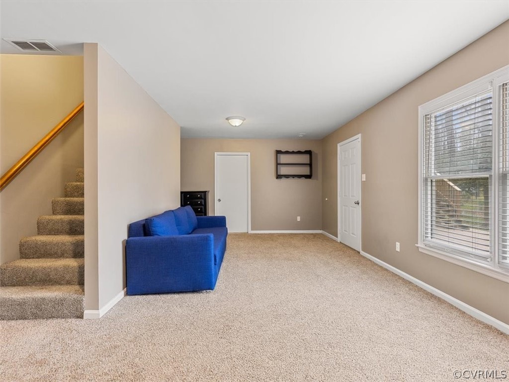 4408 Rabbit Foot Court Chesterfield, VA 23236 - Photo 28 of 36 a living room with furniture and a window