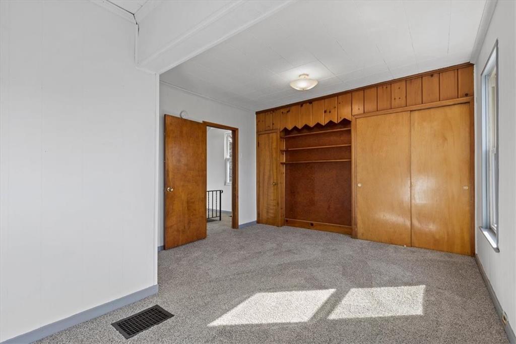 405 Walter Street Pittsburgh, PA 15210 - Photo 17 of 40 a view of an empty room with closet area
