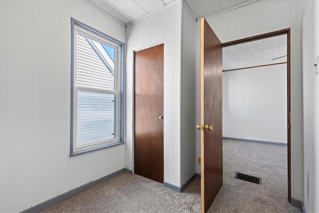 405 Walter Street Pittsburgh, PA 15210 - Photo 22 of 40 a view of an empty room and window
