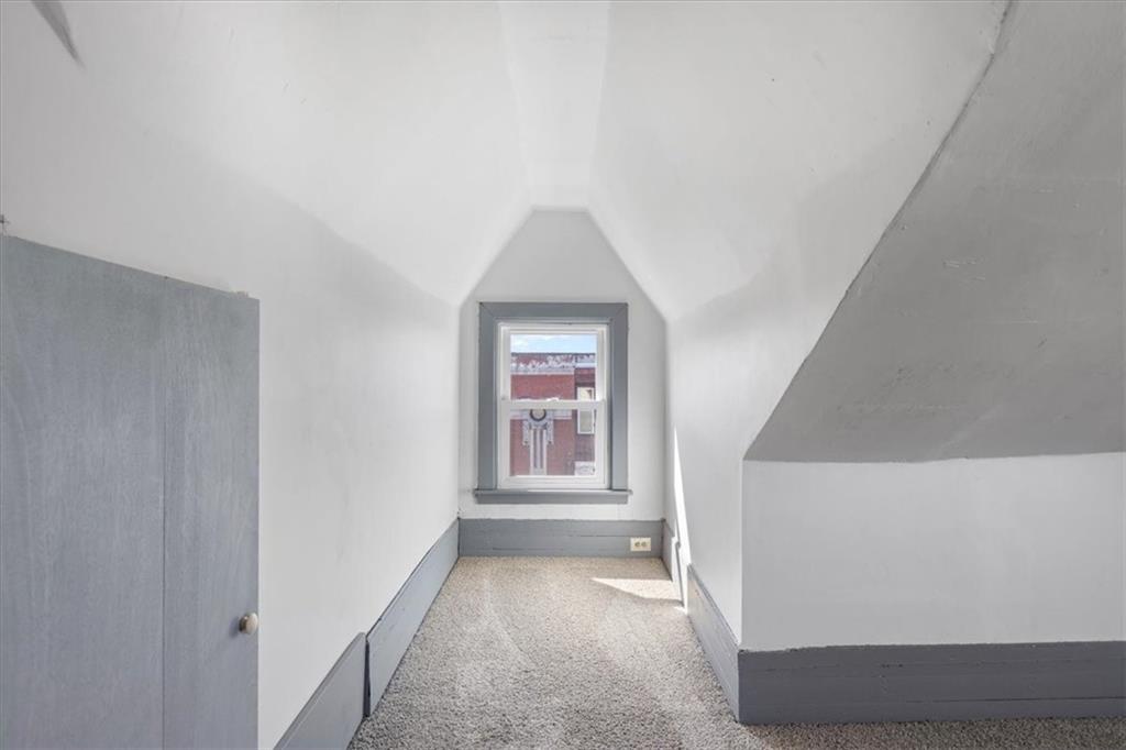 405 Walter Street Pittsburgh, PA 15210 - Photo 27 of 40 a view of a hallway with windows
