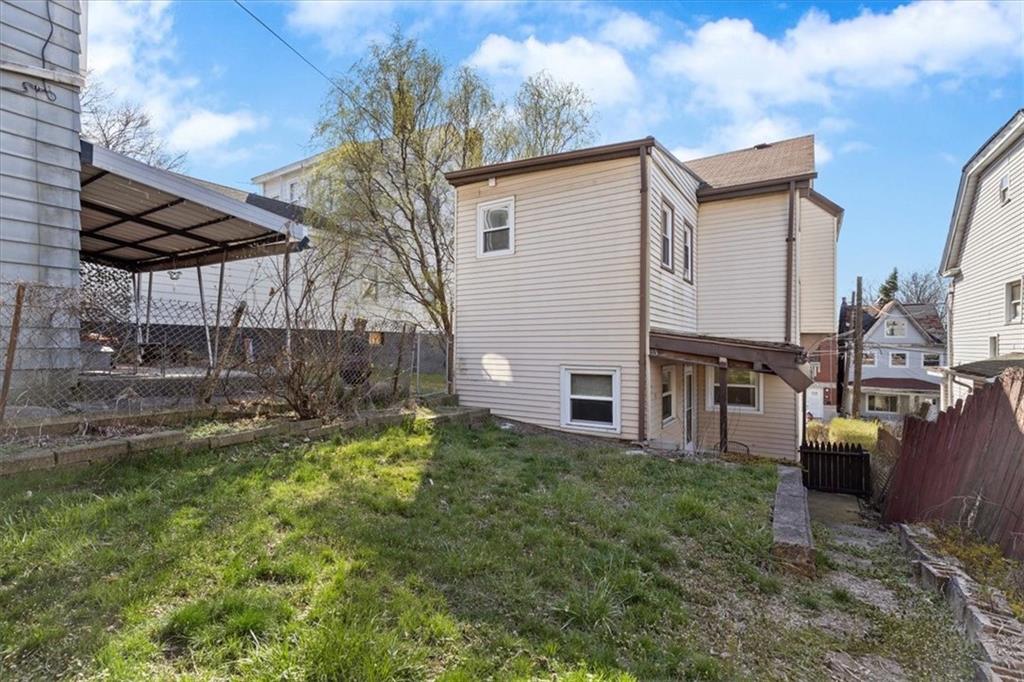 405 Walter Street Pittsburgh, PA 15210 - Photo 31 of 40 a view of a house with backyard