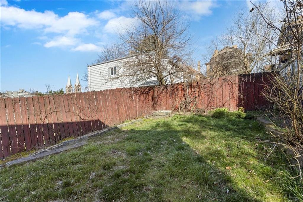 405 Walter Street Pittsburgh, PA 15210 - Photo 32 of 40 a view of backyard with wooden fence