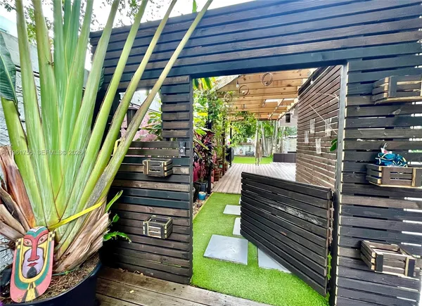 a house view with a garden space