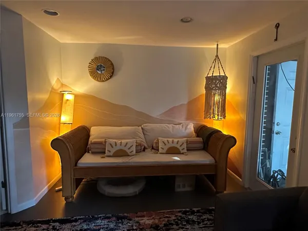 a kitchen with stainless steel appliances a stove a sink and a refrigerator