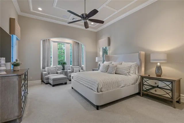 a spacious bathroom with a granite countertop sink and a bathtub