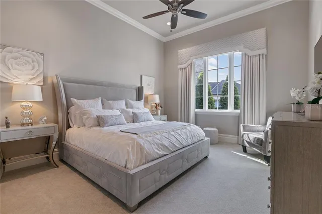 a bathroom with a granite countertop toilet sink and mirror
