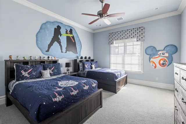 a bed room with a bed and a window