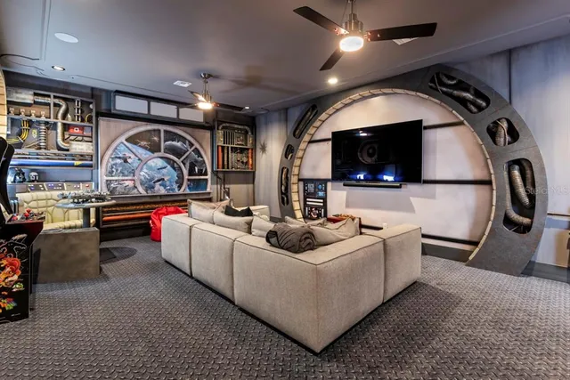 a kitchen with granite countertop cabinets stainless steel appliances and a wooden floor