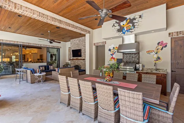 a living room with fireplace furniture and a fireplace