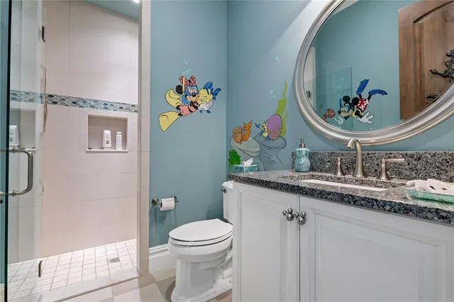 a view of a swimming pool with sitting area