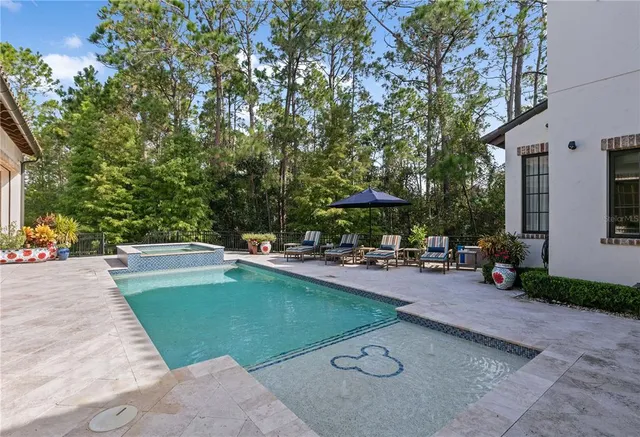 a view of a house with sitting area and furniture