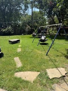 11008 Pepperidge Circle Dallas, TX 75228 - Photo 13 of 13 a view of a backyard with swimming pool