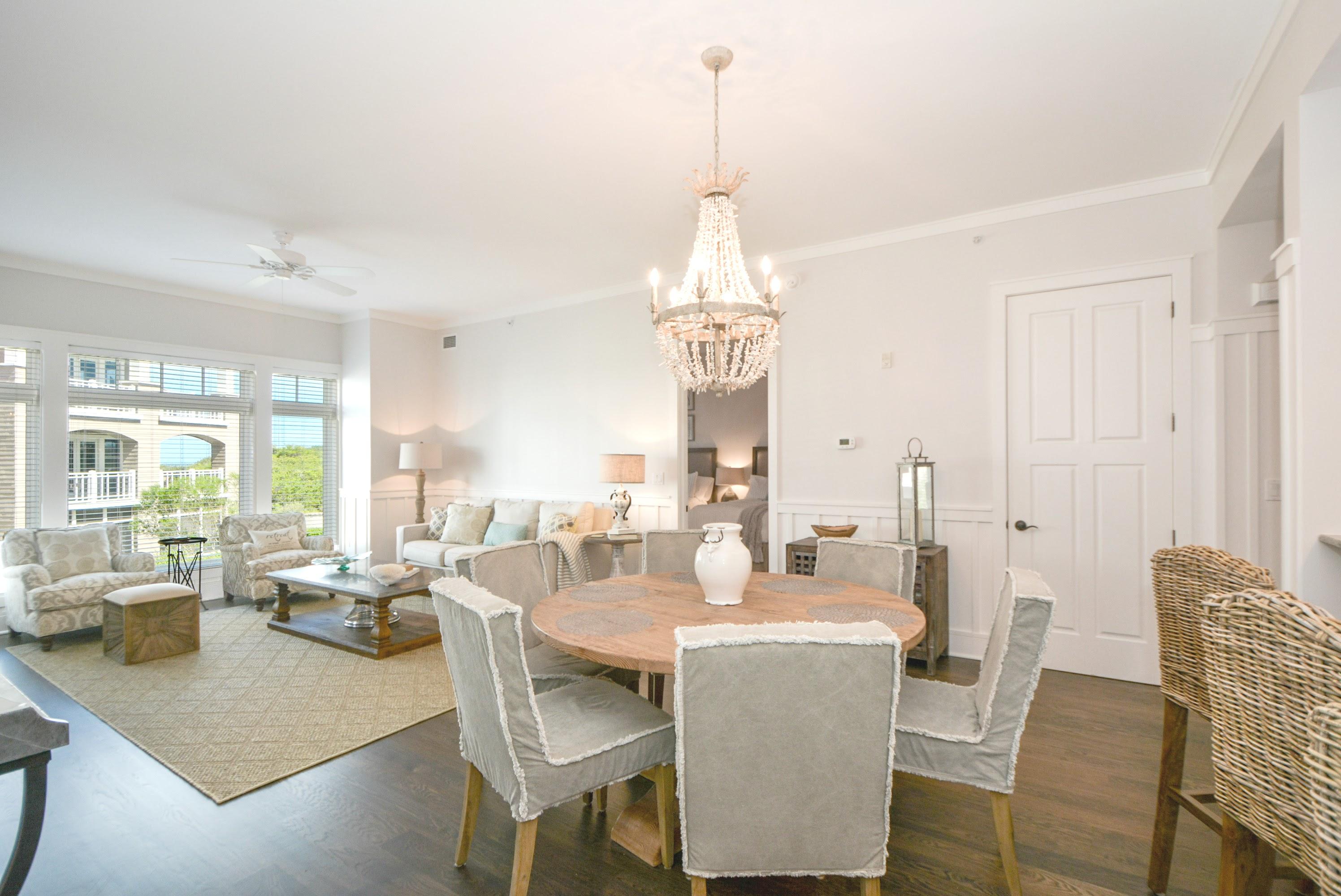 99 Compass Point Way South, Unit 201 Inlet Beach, FL 32461 - Photo 1 of 56 a view of a dining room with furniture window and outside view