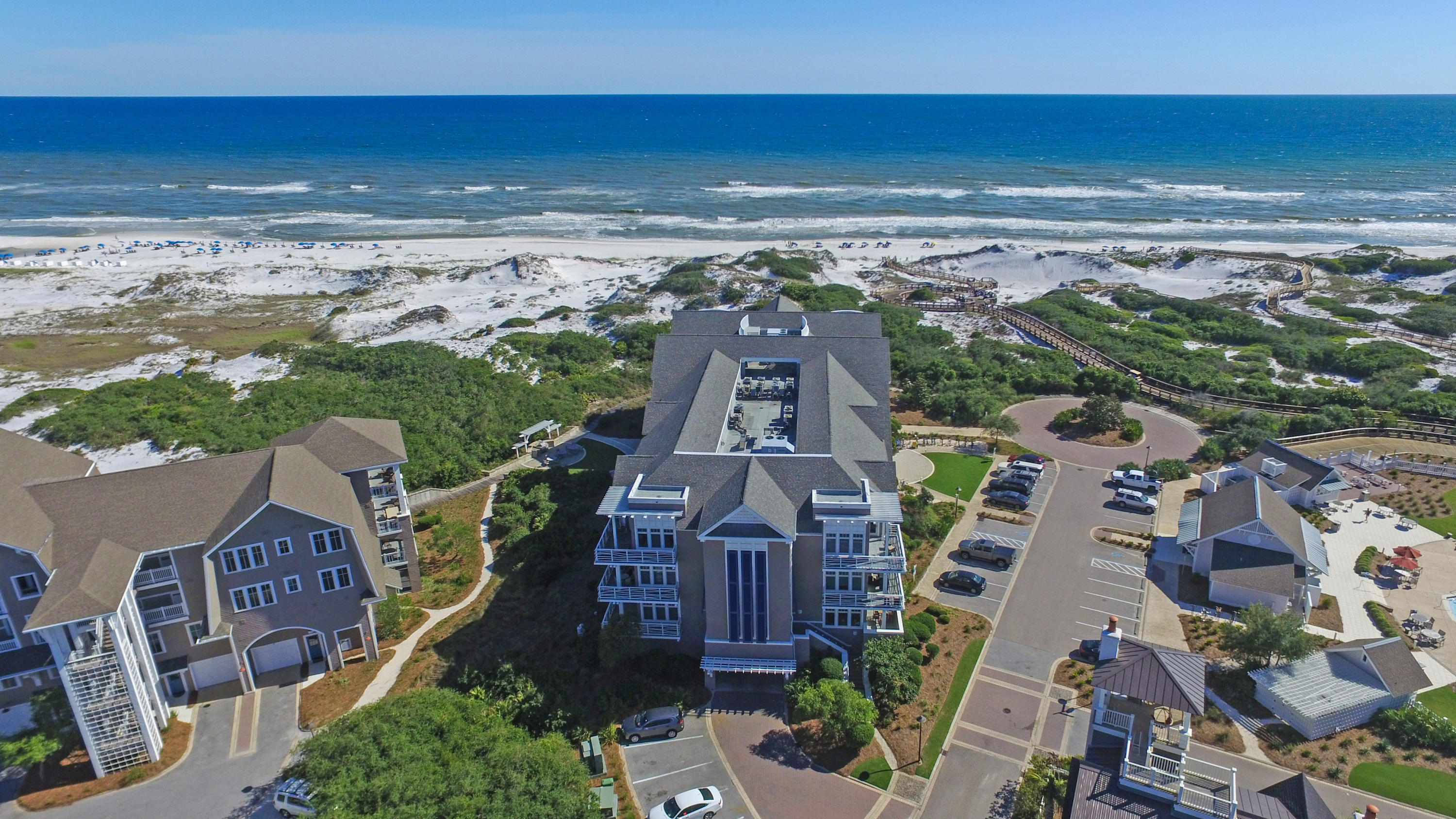 99 Compass Point Way South, Unit 201 Inlet Beach, FL 32461 - Photo 11 of 56 an aerial view of residential houses with outdoor space