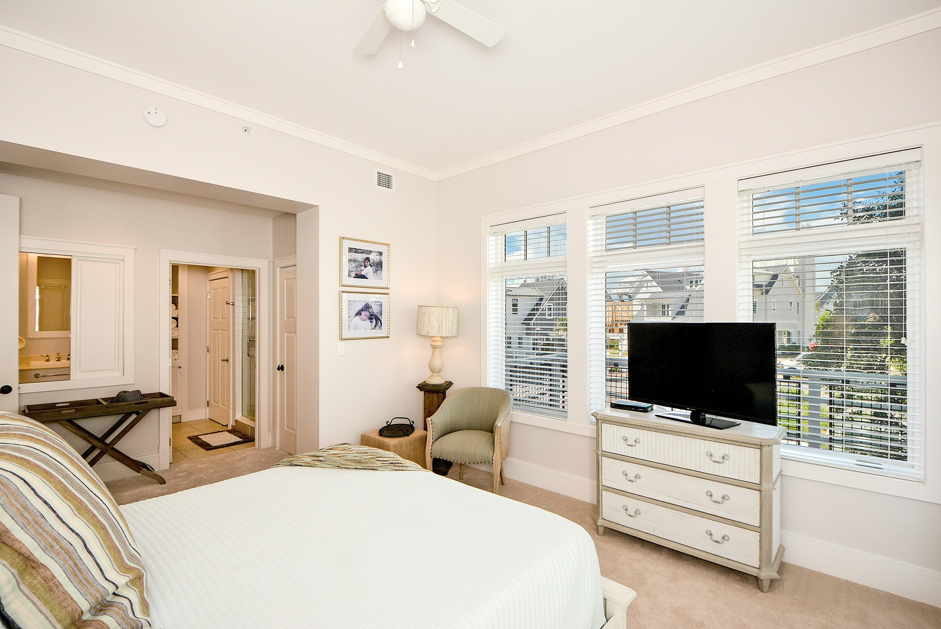 99 Compass Point Way South, Unit 201 Inlet Beach, FL 32461 - Photo 24 of 56 a room with furniture and a flat screen tv